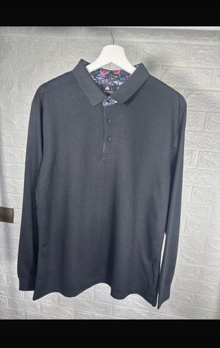 Polo negro manga larga hombre