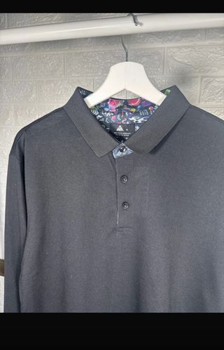 Polo negro manga larga hombre