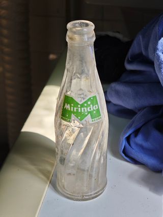 Botella de vidrio Mirinda