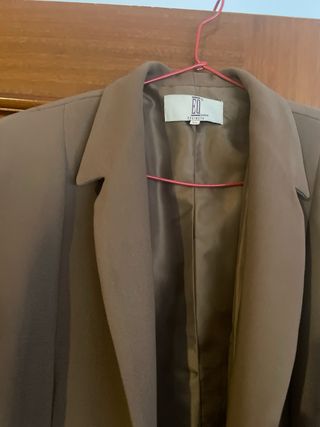 Dos chaquetas tipo americana
