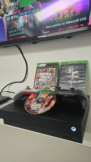 Xbox One X 1TB con accesorios y juegos 