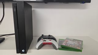 Xbox One X 1TB con accesorios y juegos 