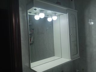 Espejo con armario y luces