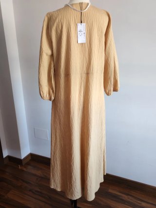 Vestido beige talla L sin estrenar.