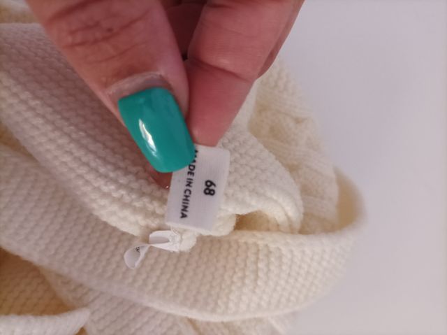 Pelele de punto crema con botones