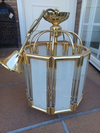 Lámpara colgante dorada y cristal