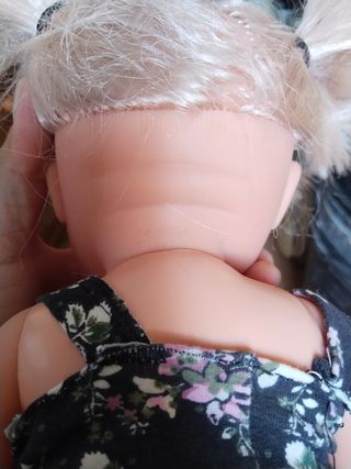 Muñeca con cochecito