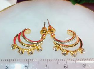 Aros triples chapados en oro con circonitas