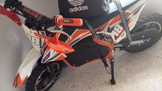 Minicross eléctrica naranja y blanca