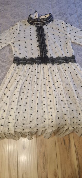 Vestido plumeti beige y negro.