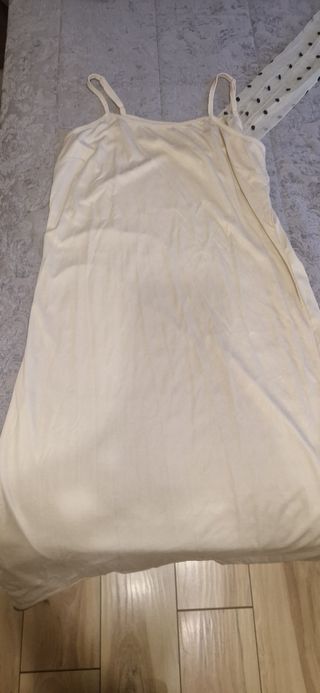 Vestido plumeti beige y negro.