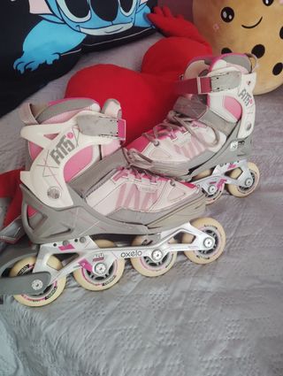 Patines en línea Oxelo rosas y blancos