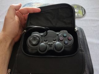 Pack PS2 con juegos y funda para viaje
