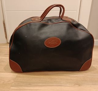 Bolsa de viaje negra y marrón