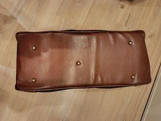 Bolsa de viaje negra y marrón