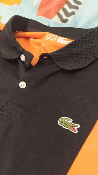 Polo Lacoste Negro y Naranja