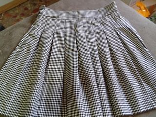 Falda colegiala cuadros blanco y negro
Falda pant