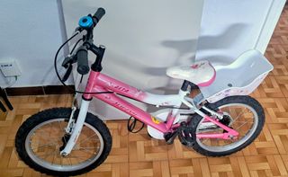 Bicicleta infantil rosa con asiento