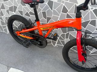 Bici infantil Monty 103 naranja + casco+ruedines

