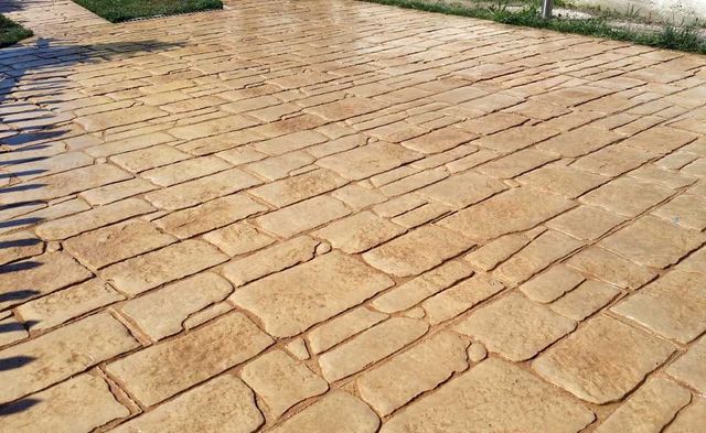 Manitas y pavimentos impresos