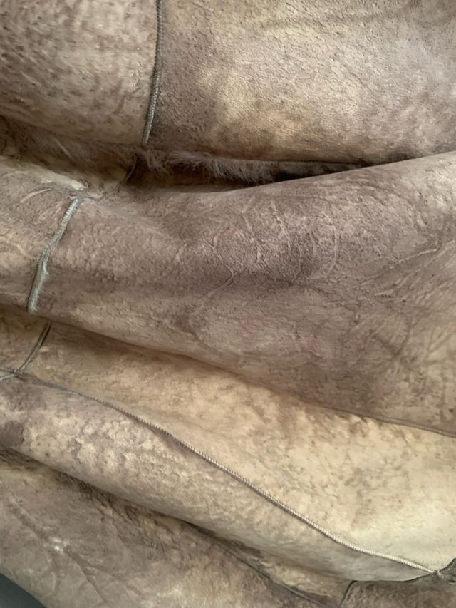 Cappotto con collo in pelliccia