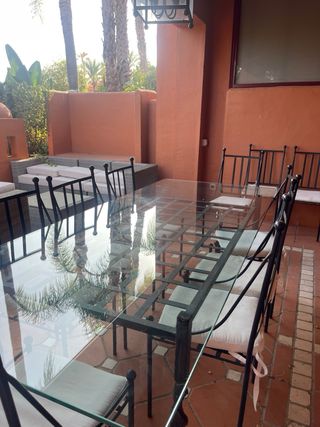 Mesa de forja y vidrio con 6 sillas