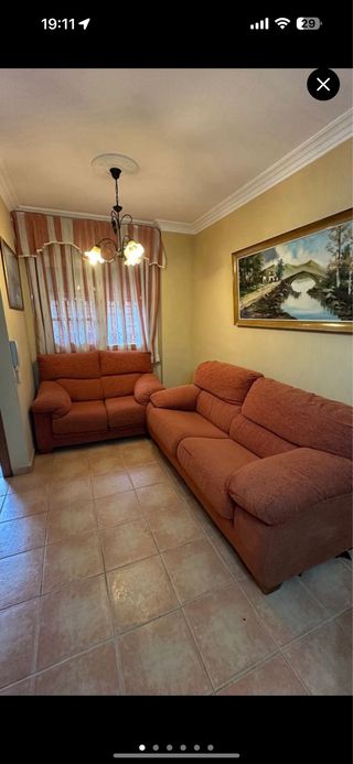 Sofá de tela naranja