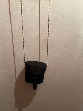 Bolsos de fiesta. Dos negros y uno dorado