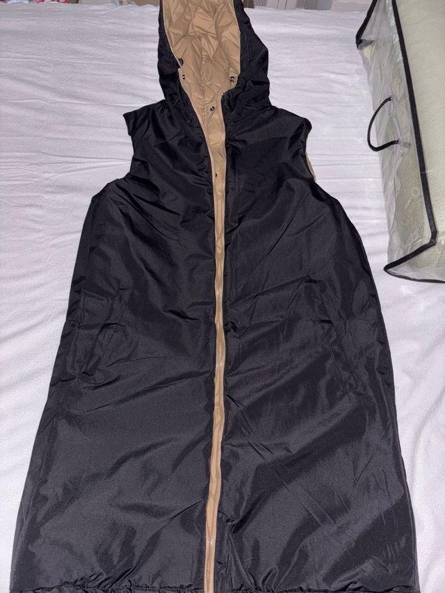 Chaleco reversible beige y negro