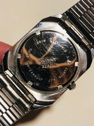 Reloj Orient Quartz Tank vintage acero – raro