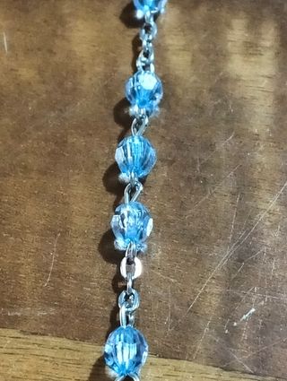 Rosario con croce e medaglia