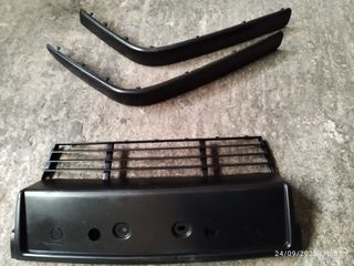 Molduras Defensa Delantera BMW E34