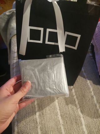 Cartera de piel sintética negra 