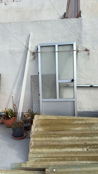 Puerta de aluminio con cristal