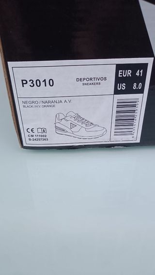 Zapatillas de seguridad grises y naranjas
