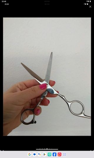 Tijeras de peluquería de acero inoxidable