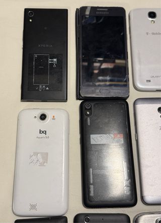 Lote 14 teléfonos para piezas