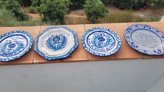 Quattro piatti in ceramica 
