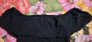 Top Tezenis nero con volant