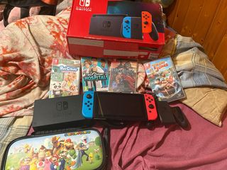Nintendo Switch con 4 juegos y funda