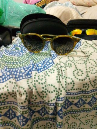 Gafas de sol Hawkers marrones escucho ofertas