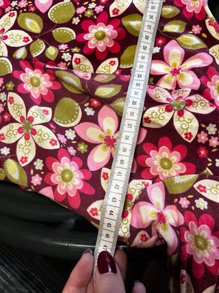 Traje de flamenca rosa y flores