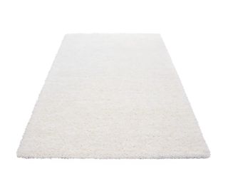 3 Alfombras de pelo largo blancas