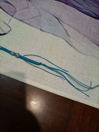 Bracciale intrecciato con ciondoli