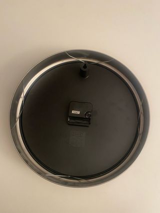 Reloj de pared de acero inoxidable