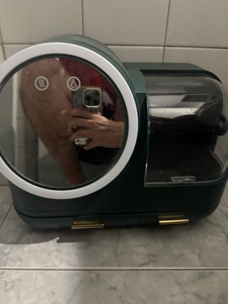 Organizador de maquillaje verde con espejo