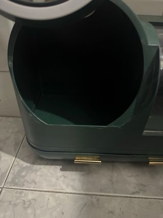 Organizador de maquillaje verde con espejo