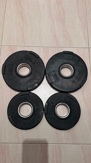 4 discos de musculación 2.5kg y 1.25kg