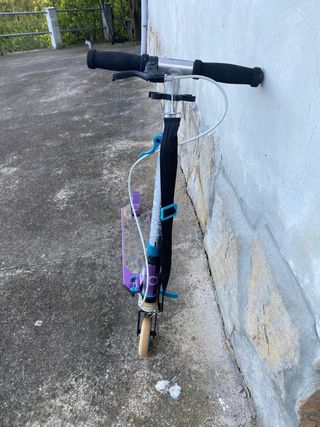 Patinete Decathlon plegable morado