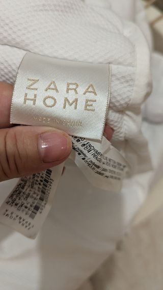 Moisés con funda acolchada y patas de Zara home 